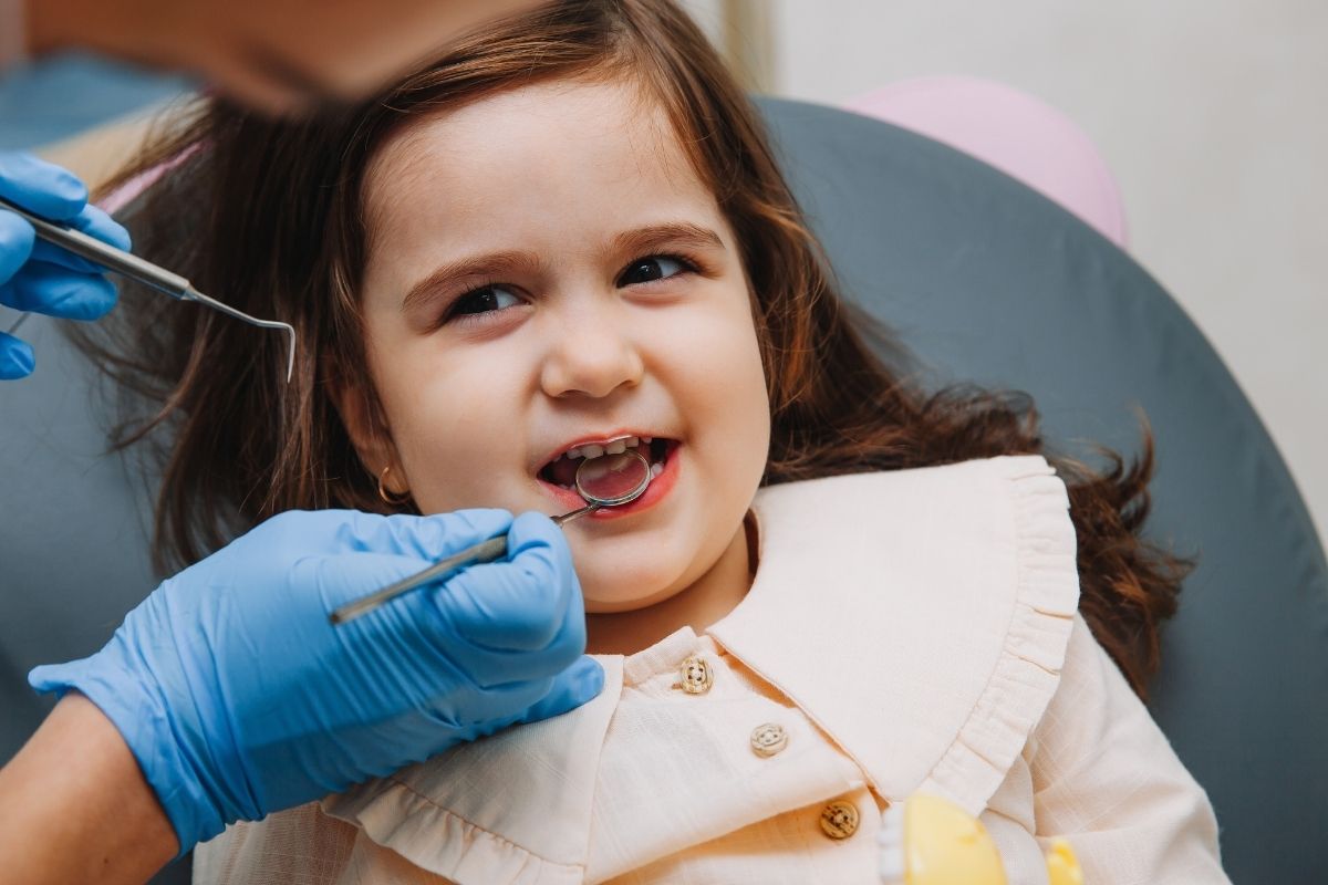 smiling kids having airway focused orthodontic checkup in dallas