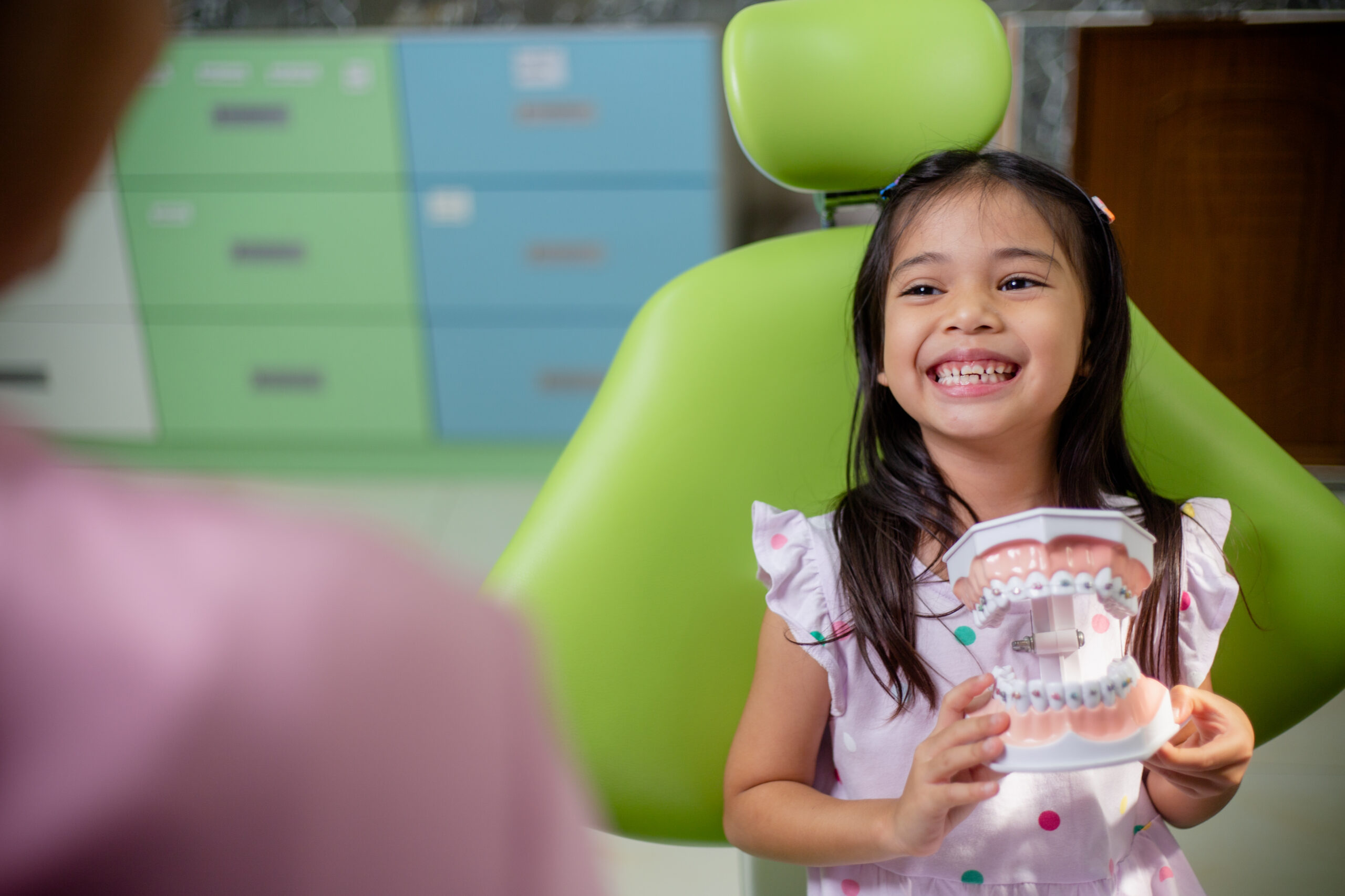 Little girls teeth are healthy in the Dental office in Dallas